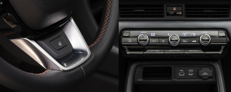 Interior view of a Honda showing the heated steering wheel button illuminated near the steering column, with the climate control panel above also displaying heated seat controls.