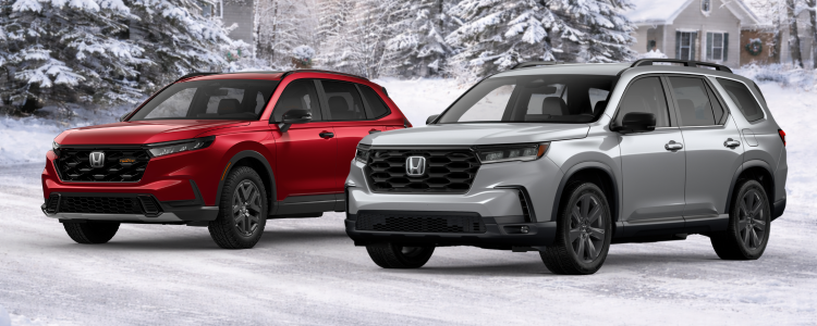 Honda CR-V and Honda Pilot parked side by side, comparing two family-friendly SUVs.