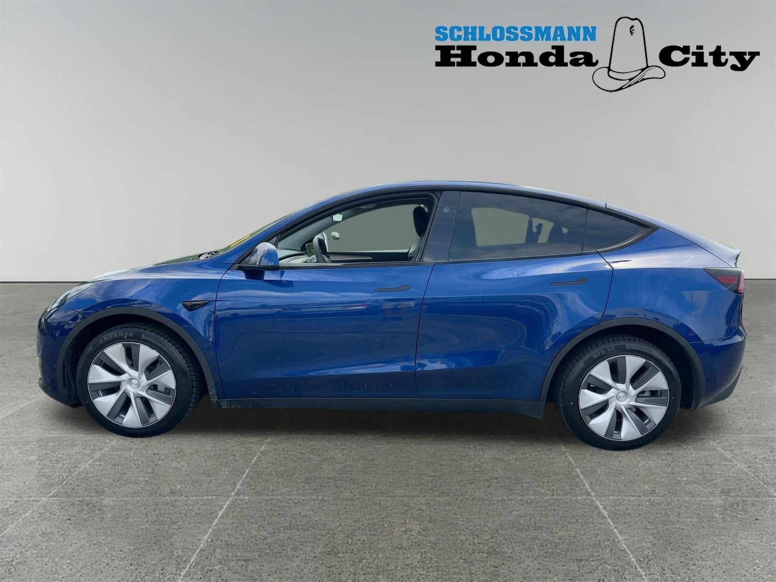 Used 2023 Tesla Model Y Long Range with VIN 7SAYGDEE9PA200235 for sale in Greenfield, WI